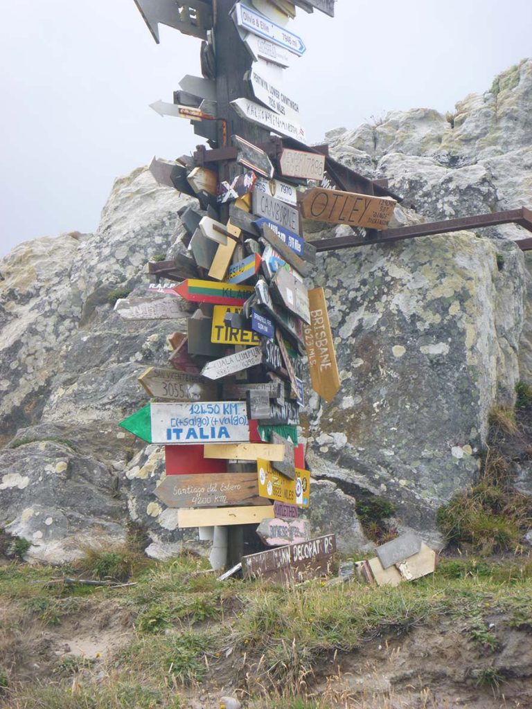 signs on a post on Falkland Island